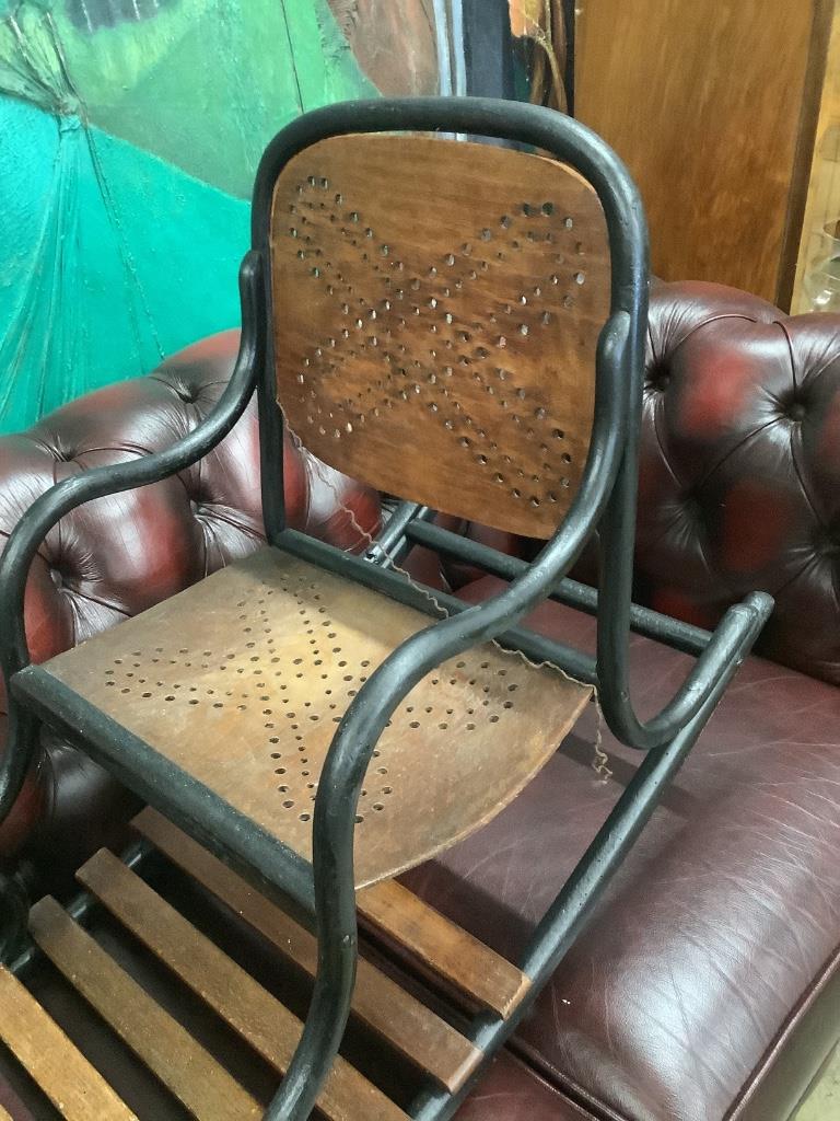 An early 20th century child's bentwood twin seat rocking chair, length 120cm